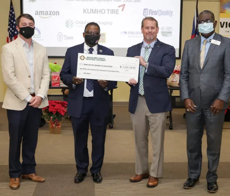 Bibb County Board of Education on Dec. 17, the school board was presented with a 1.2-million-dollar check by the Macon-Bibb County Industrial Authority.